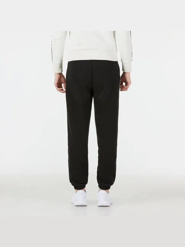 Брюки ess+ relaxed sweatpants 'black' Puma — изображение 4 из 4, черный