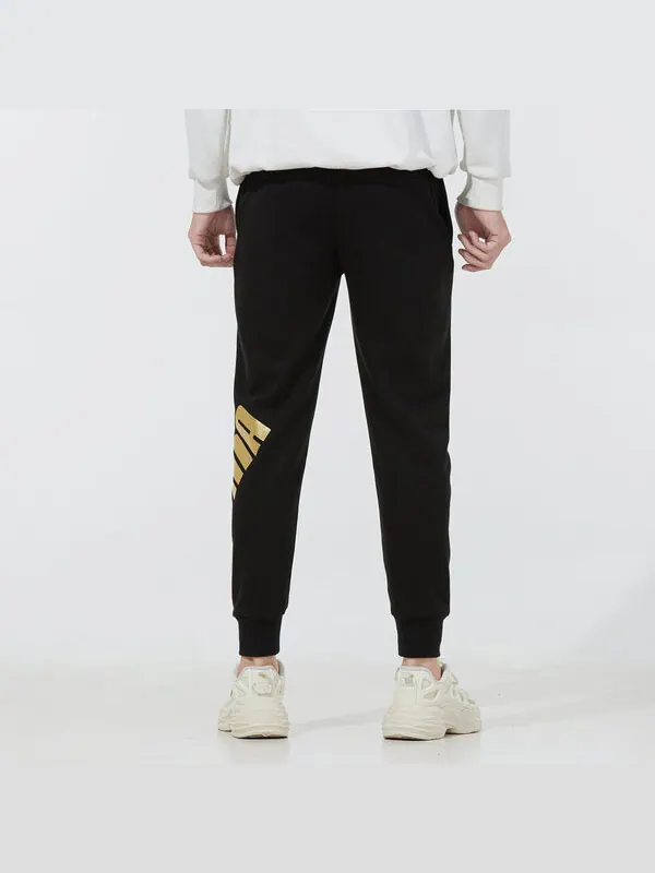 Брюки modern sports sweatpants 'black' Puma — изображение 4 из 4, черный/золотистый