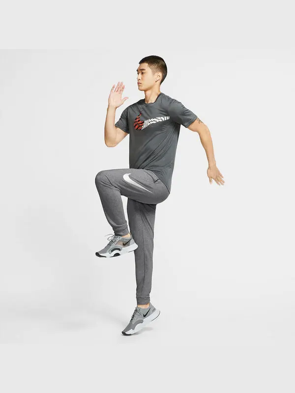 Брюки Nike Dri-FIT Tapered Training Trousers 'Grey' — изображение 2 из 3, серый/мульти