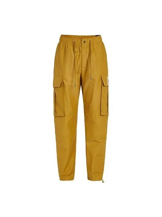 Брюки men's jordan flight woven pocket sports pants/trousers/joggers yellow Nike — изображение 1 из 4, желтый