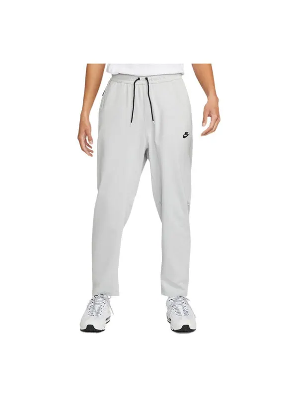 Брюки men's solid color logo training fleece bundle feet sports pants/trousers/joggers gray Nike — изображение 1 из 2, мульти