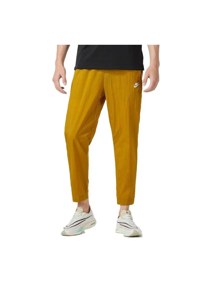 Спортивные брюки Nike Club Lightweight Woven Trousers 'Bronzine' — изображение 1 из 4, желтый