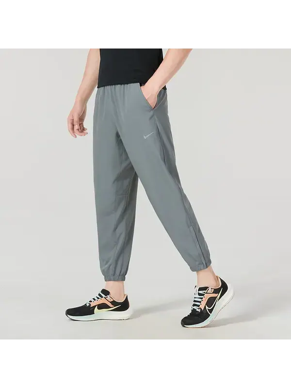 Брюки от dri fit зауженные универсальные брюки Nike — изображение 2 из 3, серый
