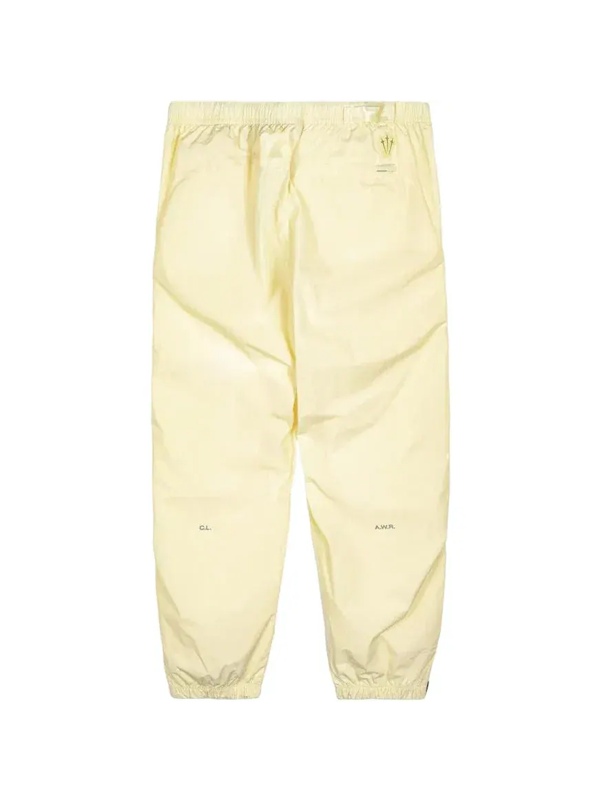 Мужские штаны Nike x NOCTA Northstar Nylon Tracksuit Pants — изображение 2 из 2, желтый