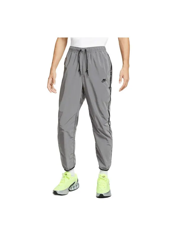 Брюки tech woven flash pants asia sizing 'reflect silver black' Nike — изображение 1 из 2, серебристый/черный
