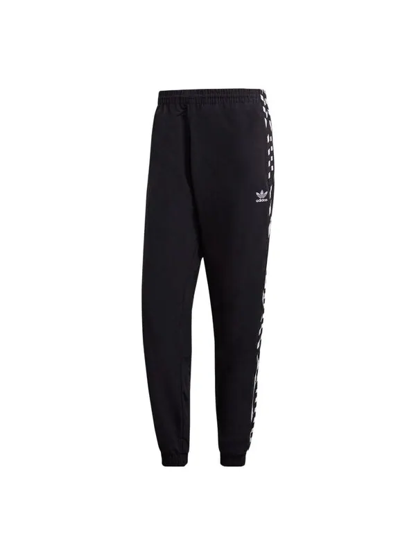 Спортивные штаны Men's adidas originals x Takahashi Riko Crossover Solid Color Sports — изображение 1 из 4, мульти