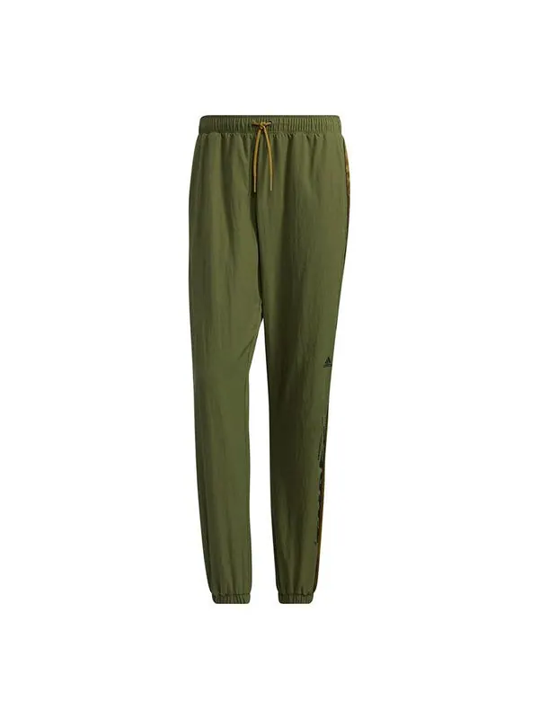 Спортивные штаны adidas M Wrd Wov Pnt Contrasting Colors Woven Loose Bundle Feet Sports Pants Green — изображение 1 из 4