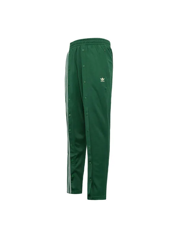 Спортивные штаны adidas originals x Ivy Park Unisex Sweatpants Green — изображение 1 из 4, зеленый