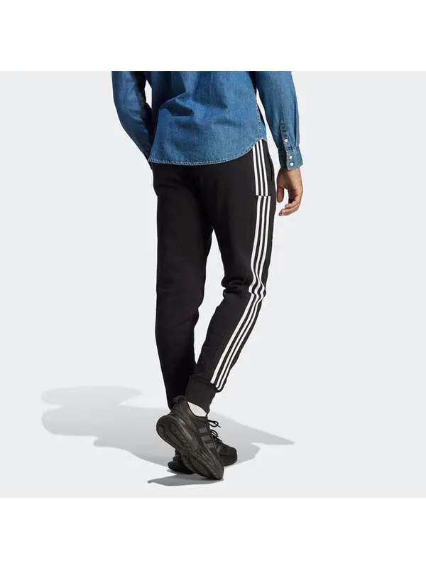 Брюки Essentials французский трикотаж зауженные манжеты 3 полоски брюки Adidas — изображение 3 из 4, черный