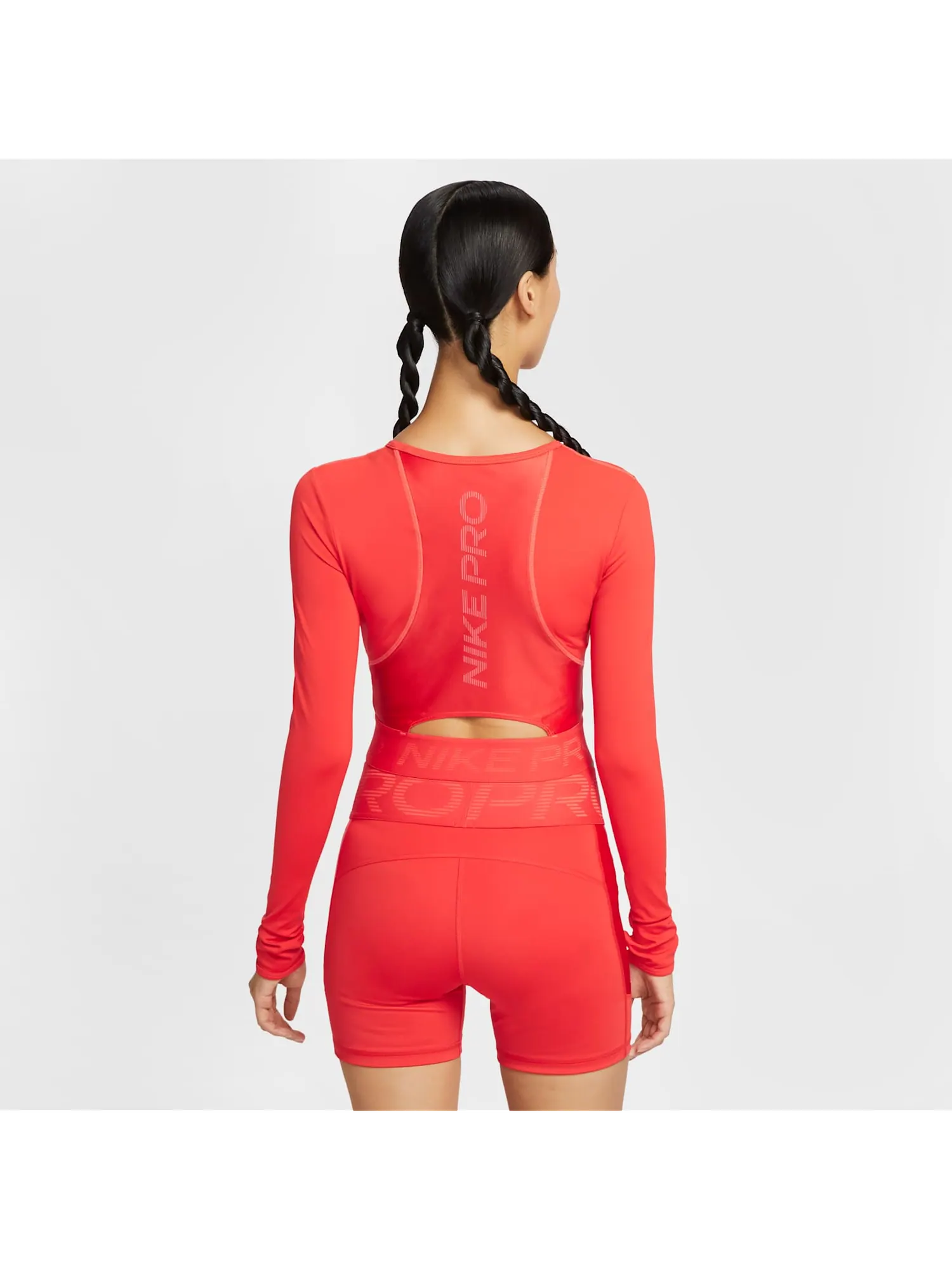 Топ (WMNS) Nike Pro Dri-Fit Cropped Long-Sleeve Top 'Light Crimson' — изображение 2 из 5, красный
