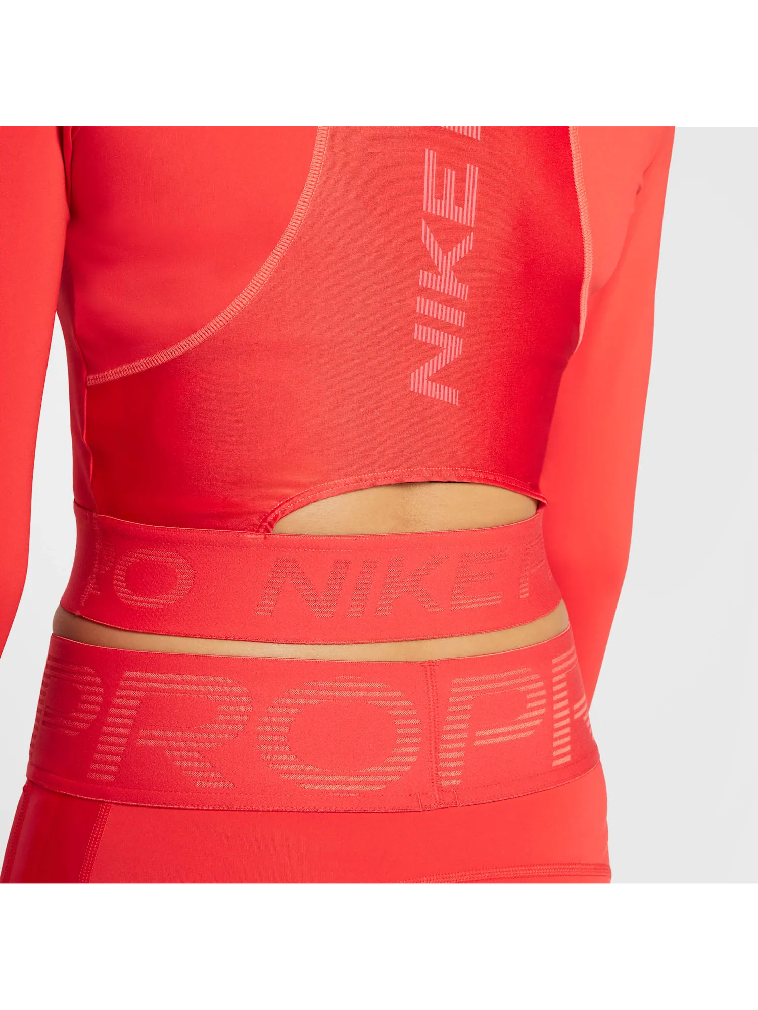 Топ (WMNS) Nike Pro Dri-Fit Cropped Long-Sleeve Top 'Light Crimson' — изображение 4 из 5, красный