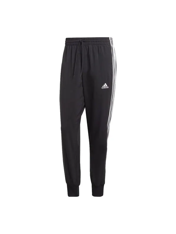 Брюки aeroready essentials с зауженными манжетами, плетеные брюки с тремя полосками Adidas — изображение 1 из 4, черный/белый