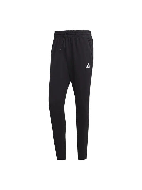 Брюки Essentials одинарный трикотажный зауженный открытый низ брюки Adidas — изображение 1 из 4, черный