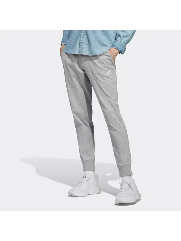 Брюки Essentials одинарные трикотажные брюки с зауженными манжетами Adidas — изображение 3 из 4, серый