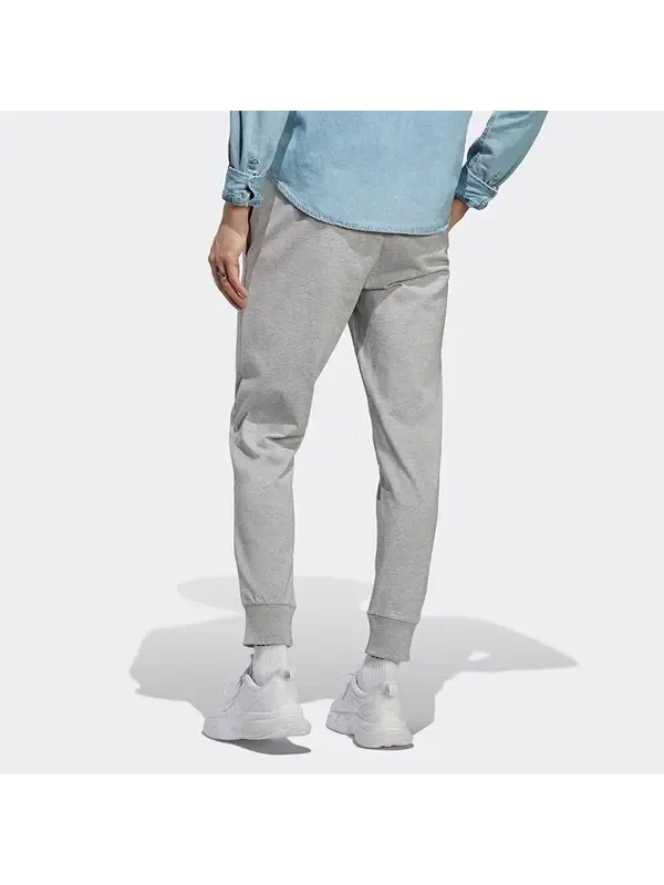 Брюки Essentials одинарные трикотажные брюки с зауженными манжетами Adidas — изображение 4 из 4, серый
