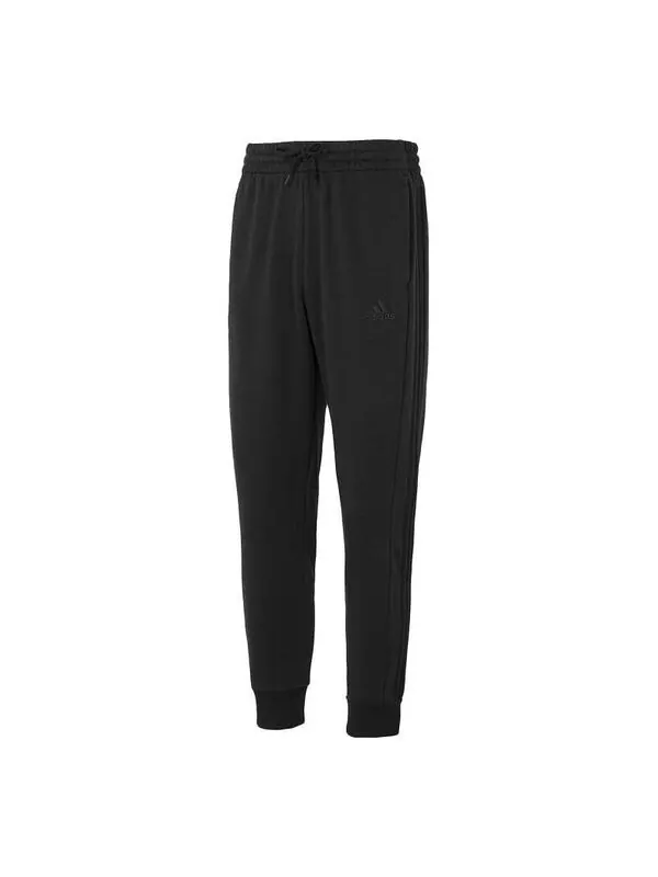 Брюки Essentials флисовые брюки с 3 полосками и зауженными манжетами Adidas — изображение 1 из 4, черный