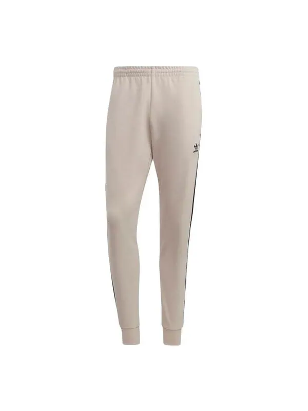 Штаны оригинальные adicolor classics sst спортивные штаны Adidas — изображение 1 из 1, бежевый/черный