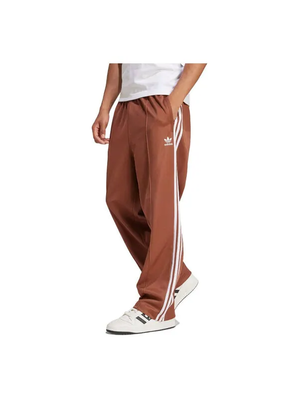 Штаны adicolor baggy fit firebird спортивные штаны Adidas — изображение 1 из 2, коричневый