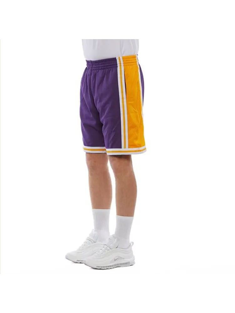 Спортивные шорты Mitchell & Ness NBA Swingman Shorts Los Angeles Lakers Road 1984-85 'Purple Gold' — изображение 5 из 6