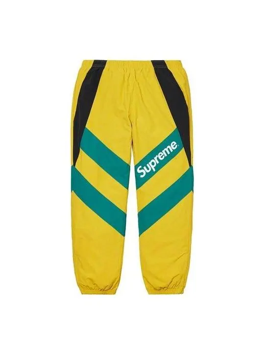 Брюки paneled track pants 'yellow green black' Supreme — изображение 1 из 2, желтый/зеленый/черный