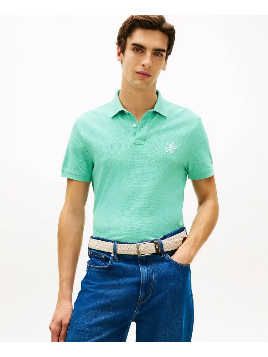 Мужская классическая рубашка-поло TH с вышитым контрастным логотипом Tommy Hilfiger — изображение 1 из 4, голубой