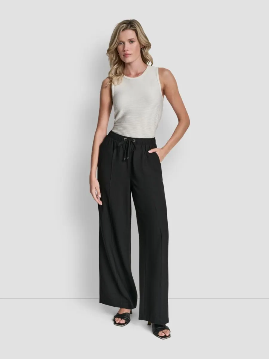 Женские брюки с жатой поверхностью и эластичным поясом DKNY — изображение 5 из 6, черный