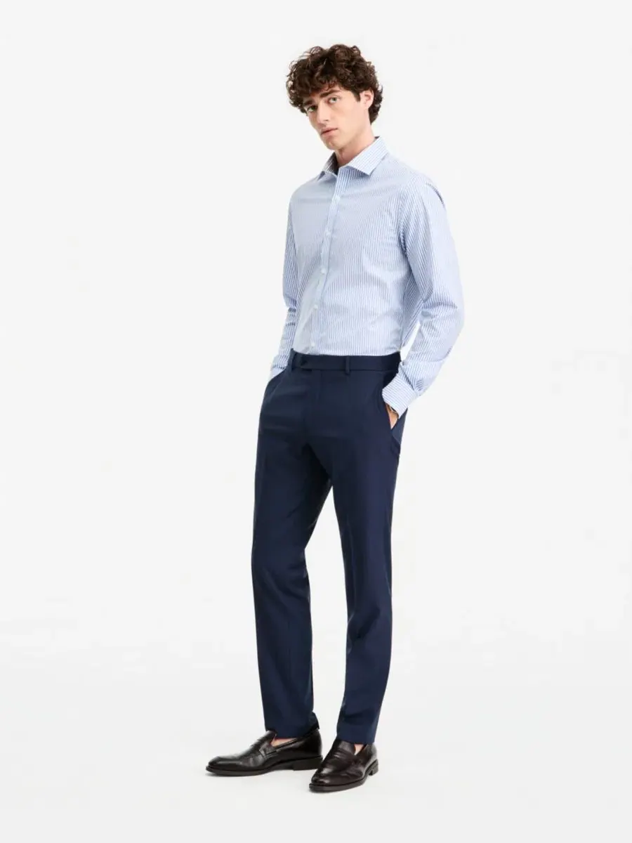 Брюки классические с зауженным силуэтом TH-Flex Stretch Tommy Hilfiger — изображение 2 из 6, синий