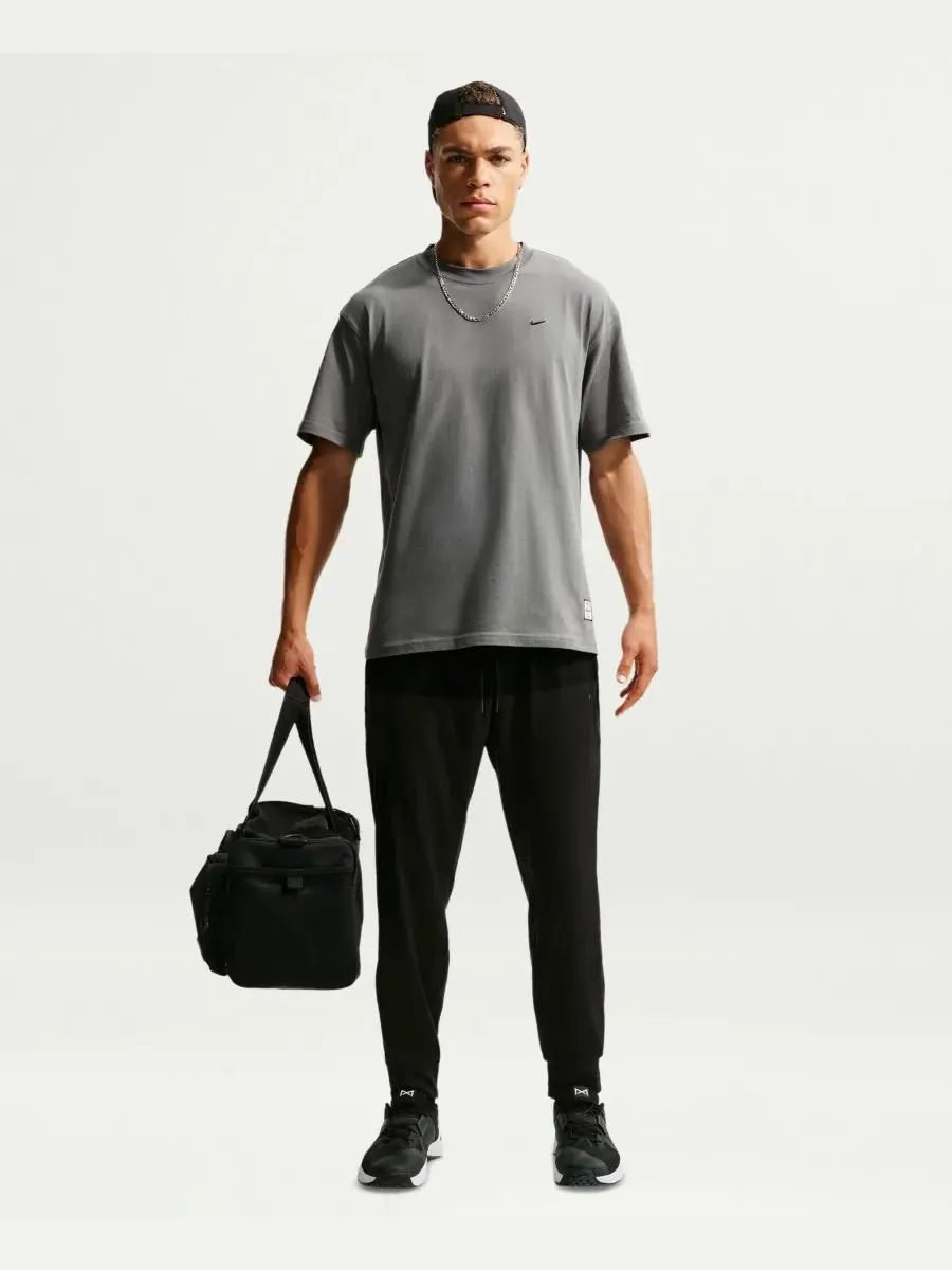 Мужские спортивные брюки Primary NanoKnit Dri-FIT с защитой от УФ-излучения Nike — изображение 2 из 5, черный