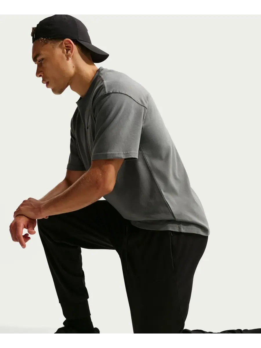 Мужские спортивные брюки Primary NanoKnit Dri-FIT с защитой от УФ-излучения Nike — изображение 3 из 5, черный