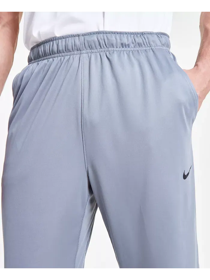 Мужские универсальные брюки Totality Dri-FIT с открытым краем Nike — изображение 4 из 8, серый