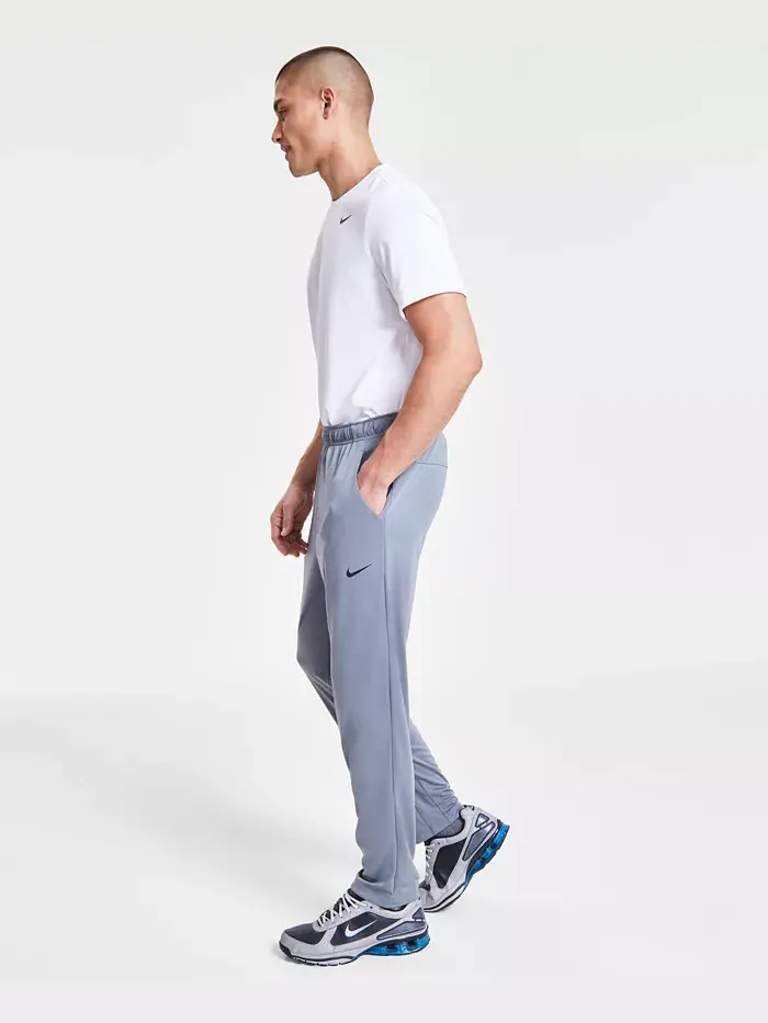 Мужские универсальные брюки Totality Dri-FIT с открытым краем Nike — изображение 6 из 8, серый