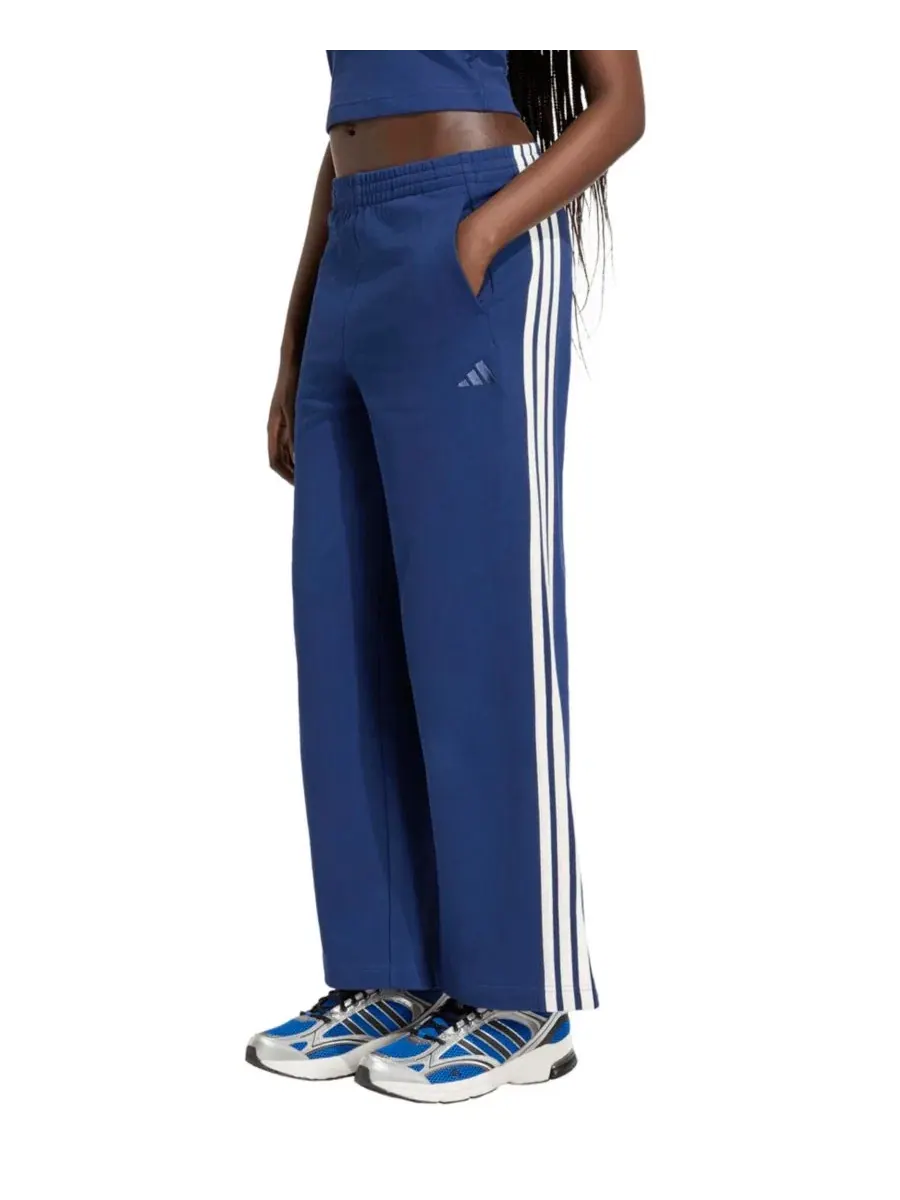 Штаны спортивные свободного кроя с лампасами adidas