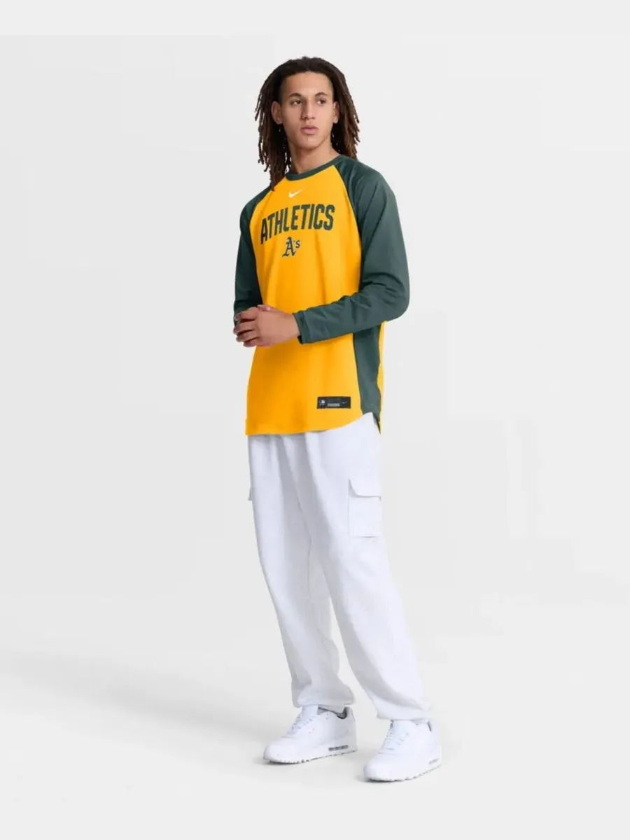 Свитшот с регланом, длинным рукавом, модель Athletics Authentic Collection Raglan Dri-FIT Nike — изображение 2 из 3, золото