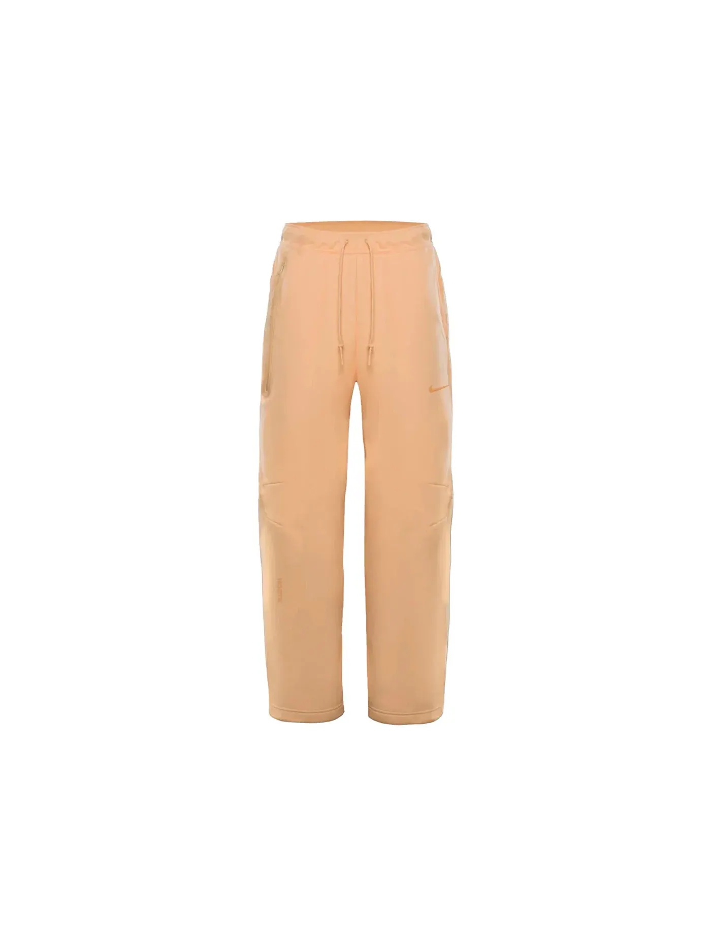 Мужские спортивные штаны из флиса с открытым низом NOCTA Tech Fleece Nike, Ice Peach — изображение 1 из 1
