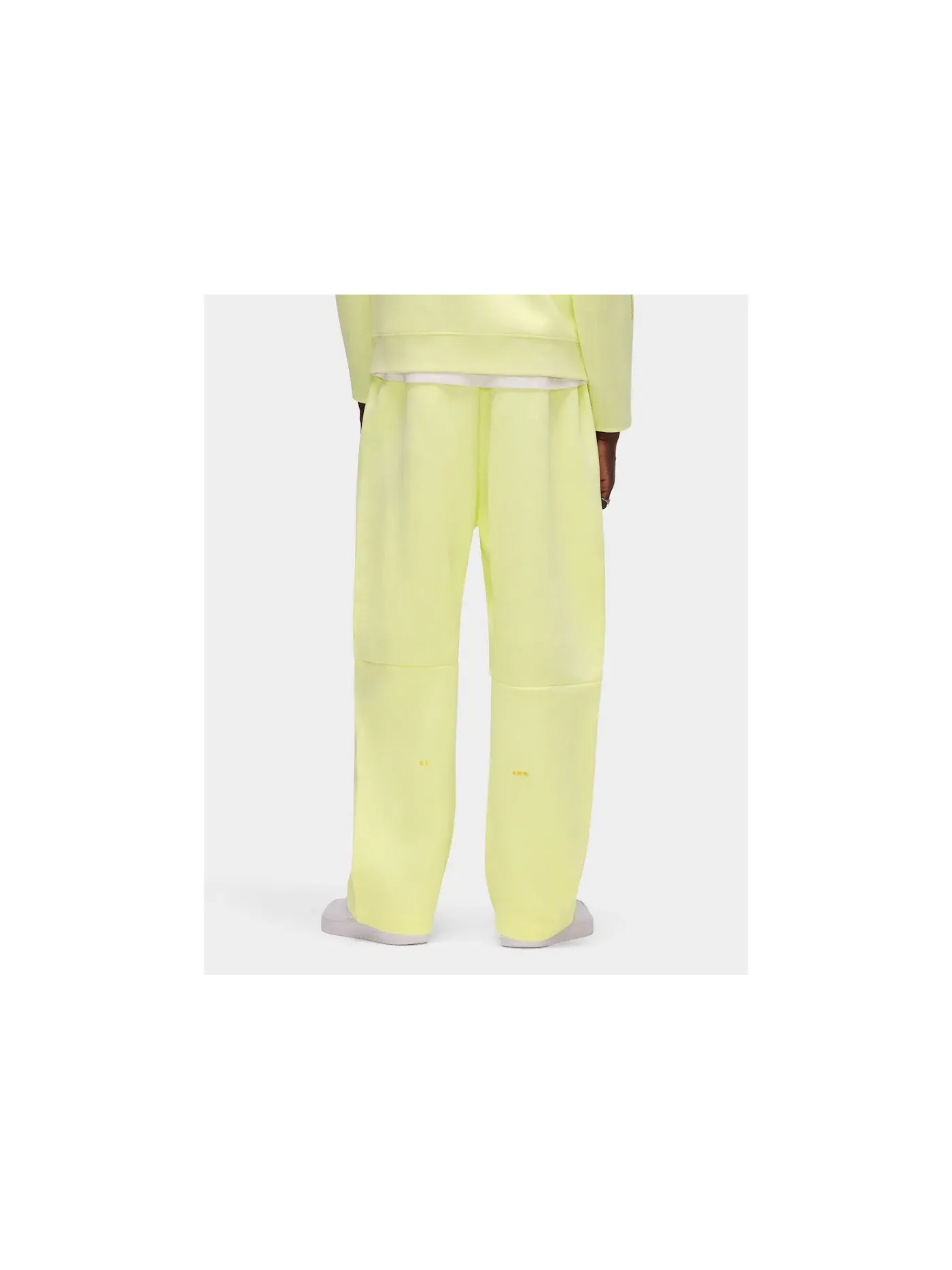 Мужские спортивные штаны из флиса Tech Fleece с открытым низом Nike x NOCTA, Citron Tint/Vivid Sulfur — изображение 5 из 5