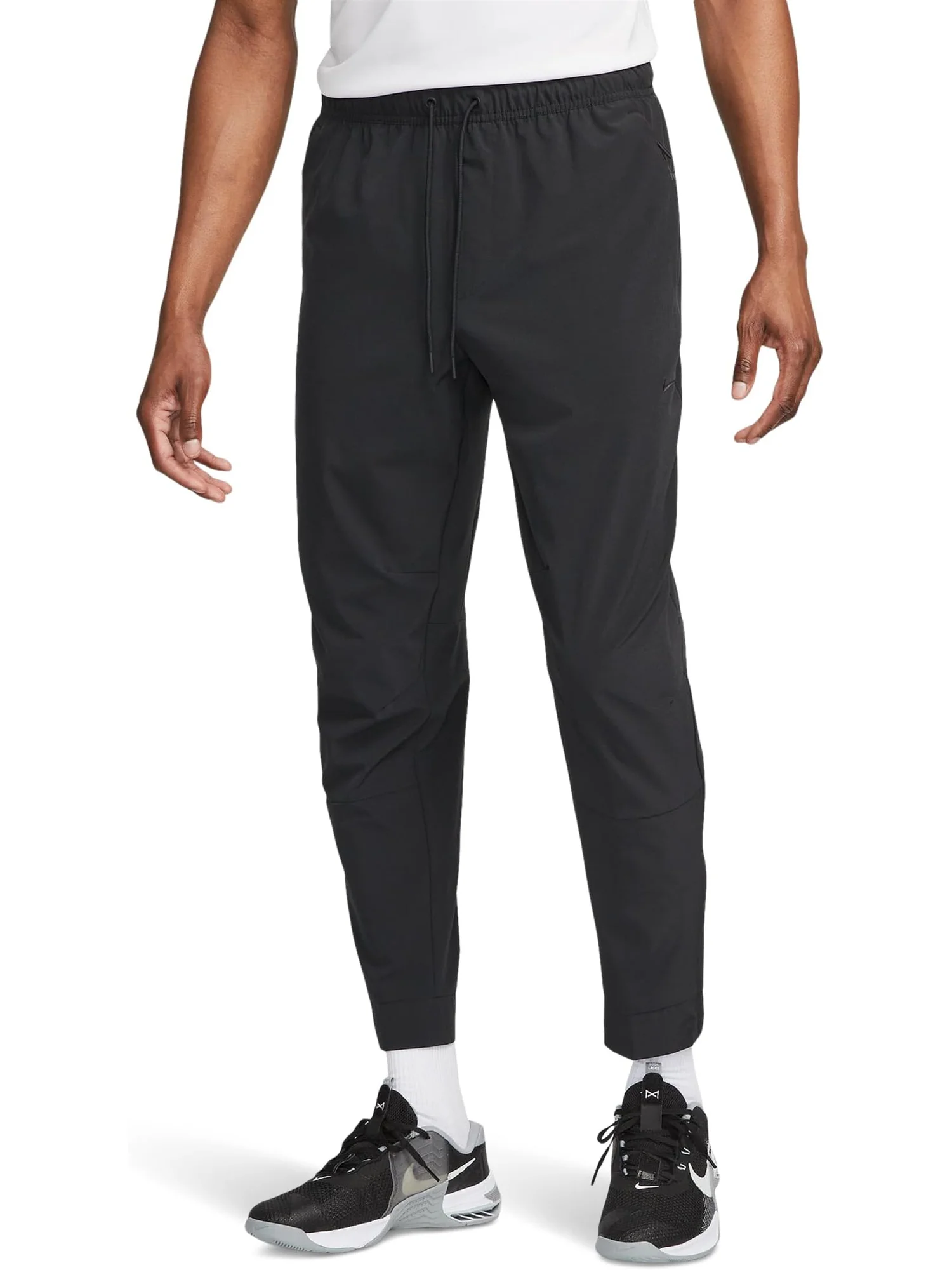 Мужские универсальные зауженные брюки Unlimited Dri-FIT Nike