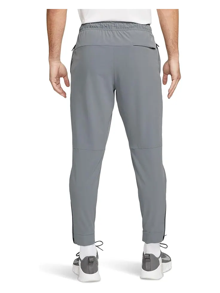 Брюки Nike Dri-FIT Unlimited Tapered Pants — изображение 2 из 3, серый/черный/серый