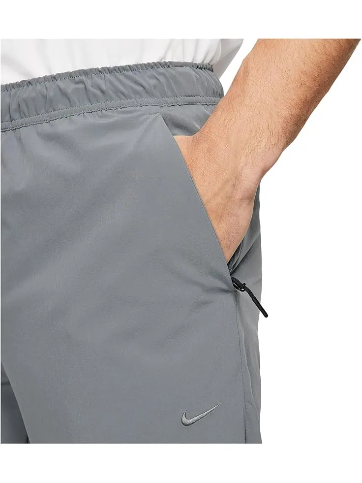 Брюки Nike Dri-FIT Unlimited Tapered Pants — изображение 3 из 3, серый/черный/серый