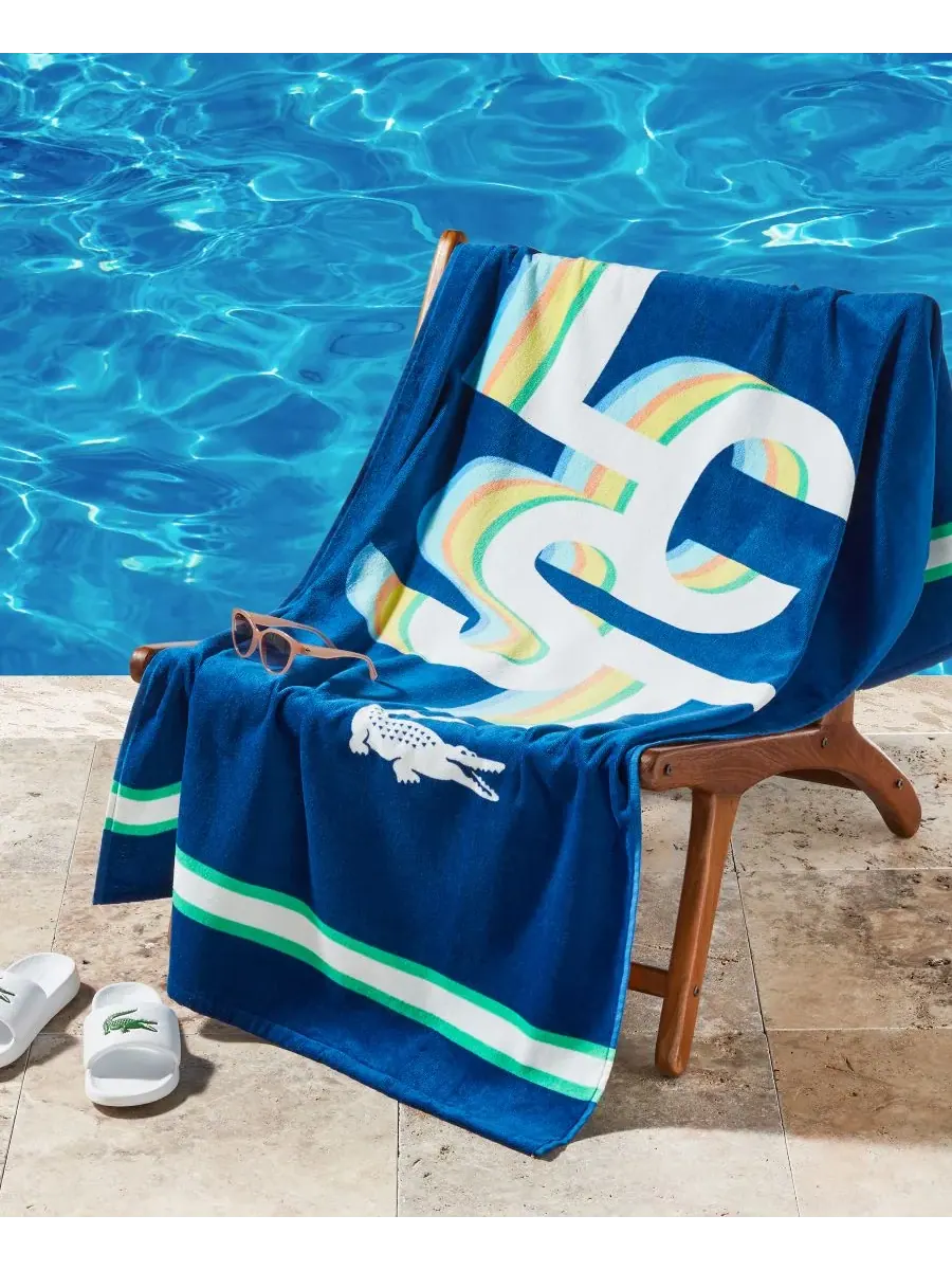 Пляжное полотенце из хлопка с забавными надписями Lcst, 91 см x 183 см Lacoste — изображение 1 из 3, синий