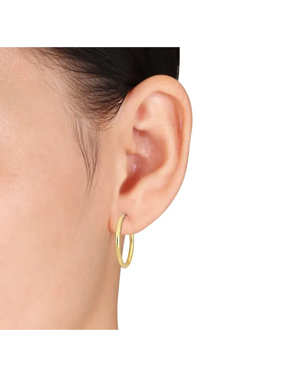 Серьги-кольца Amour 25 мм из желтого золота 14 карат — изображение 3 из 4, оттенок желтый