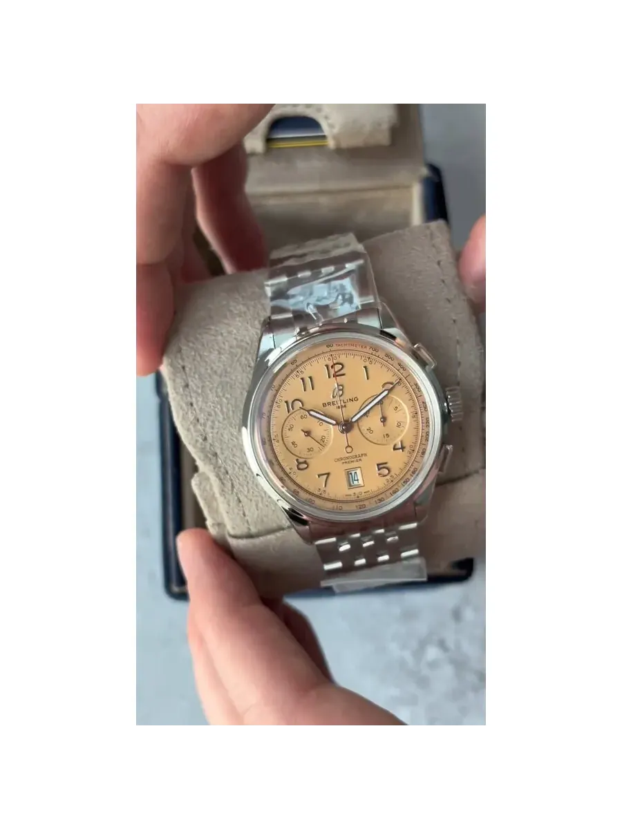 Мужские часы Breitling Premier B01 Chronograph 42 Automatic Chronometer с лососевым циферблатом AB0145331K1A1