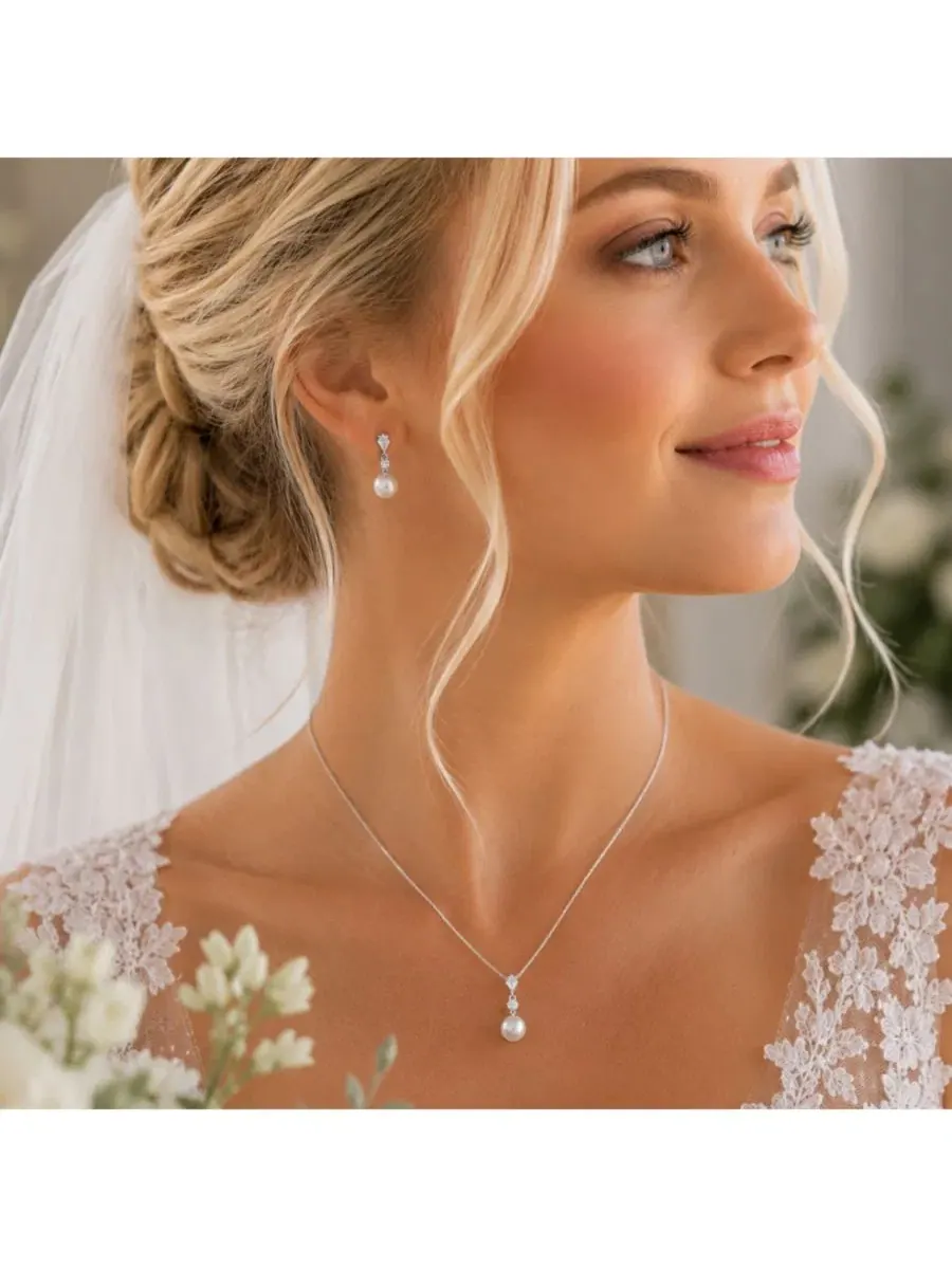 Серьги-подвески с жемчугом из фианита, модель Pear Cut, бренд Dloria — изображение 3 из 4, оттенок серебряный