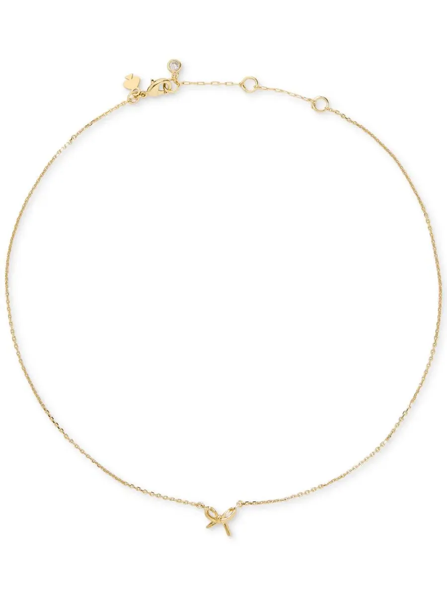 Кулон-подвеска с бантом Girlie Pearlie Cubic Zirconia Mini Bow kate spade new york — изображение 1 из 3, оттенок золото