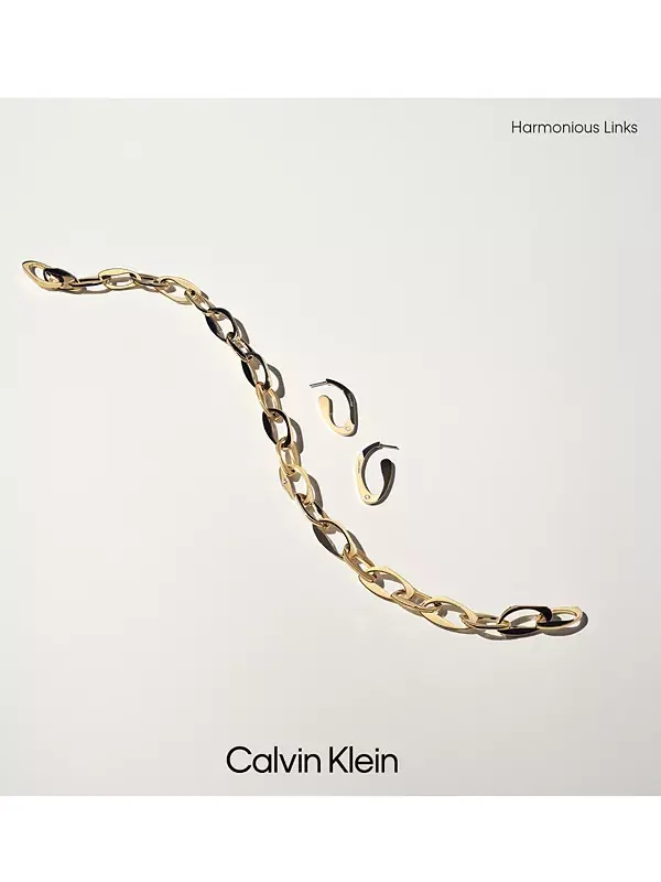 Средние скульптурные удлиненные серьги-кольца с паве Calvin Klein — изображение 4 из 4, оттенок серебряный