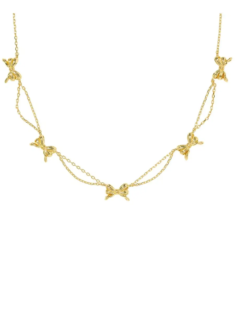 Колье-цепочка с бантом из 14-каратного золота, модель Bow Strand Kendra Scott — изображение 1 из 8, оттенок золото