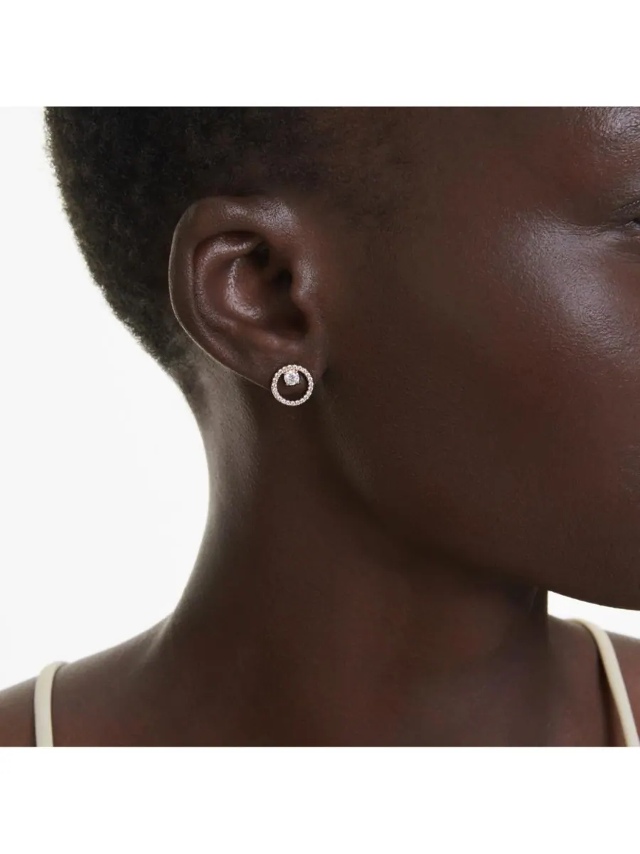 Белые серьги-гвоздики Constella с круглой огранкой Swarovski — изображение 5 из 9, оттенок розовый золотистый