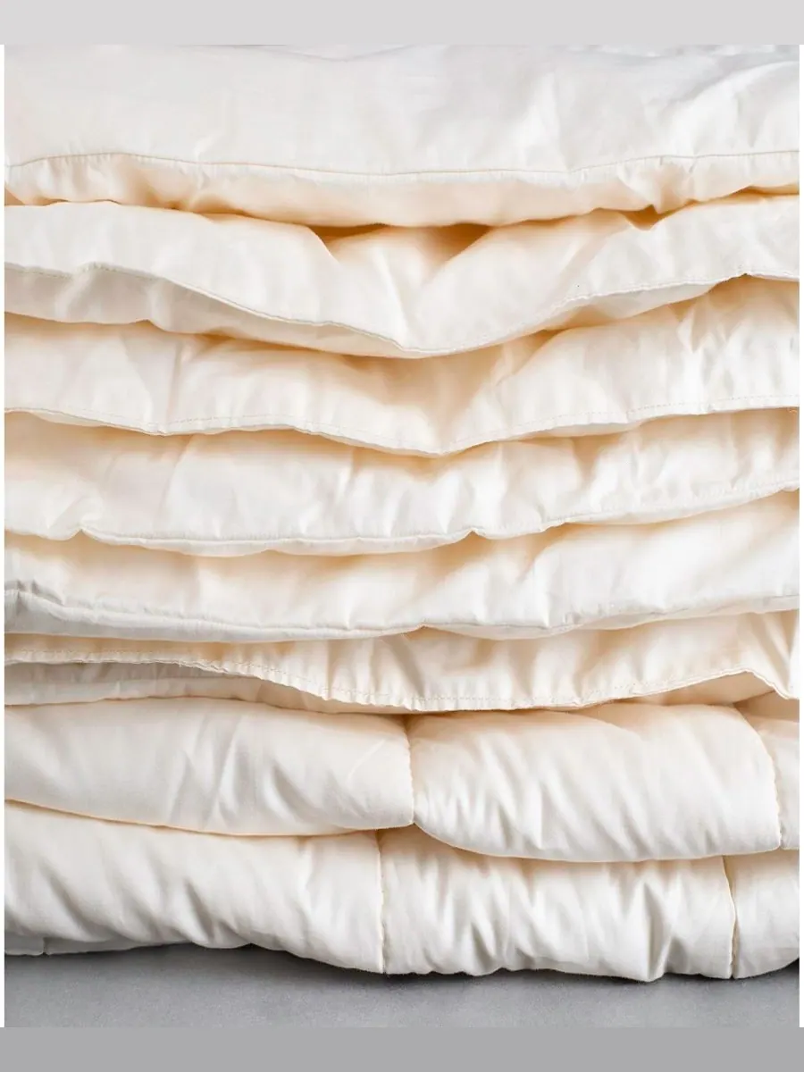 Легкое одеяло myMerino с наполнителем из мериносовой шерсти для детской кроватки Sleep & Beyond — изображение 7 из 8, белый