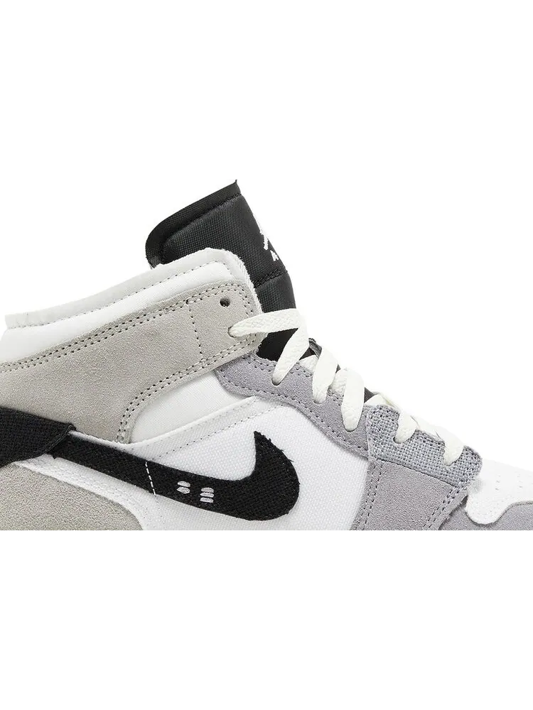 Кроссовки Air Jordan 1 Mid SE Craft GS 'Inside Out - Cement Grey' — изображение 2 из 4, серый