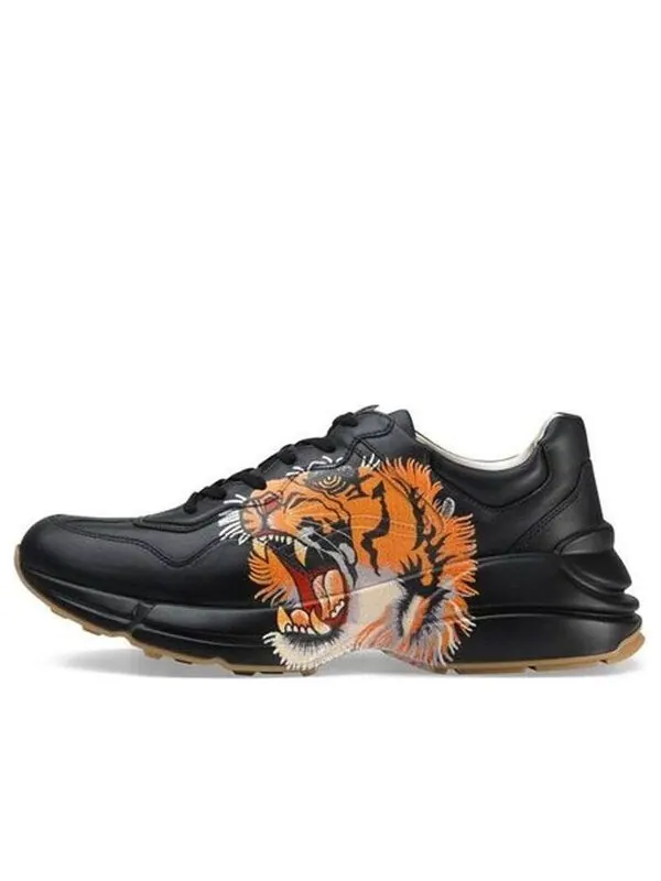 Кроссовки rhyton leather 'tiger print' Gucci — изображение 1 из 4, черный/оранжевый