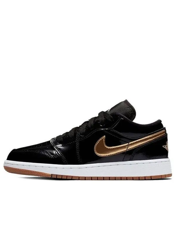 Кроссовки 1 низкие Air Jordan — изображение 1 из 4, черный/золотистый